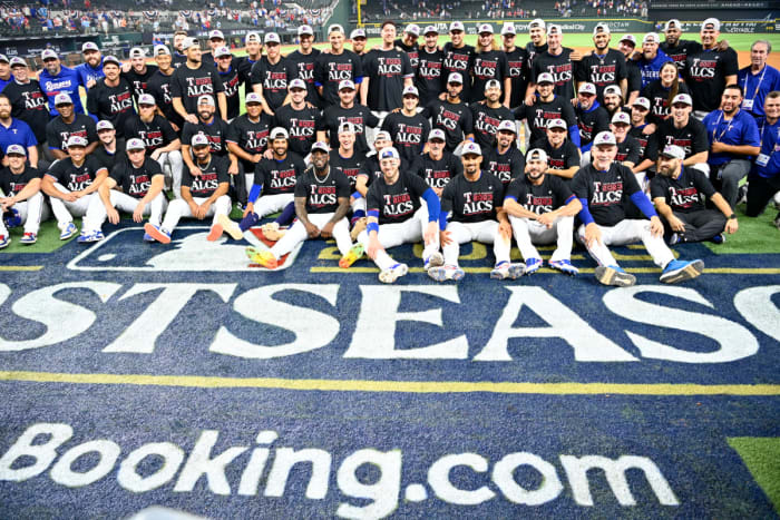 The Texas Rangers pose for a group photo after sweeping the Baltimore Orioles in Game 3 of the ALDS Tuesday night at Globe Life Field.